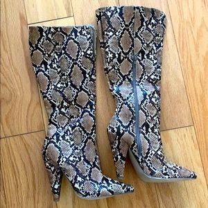 Knee high snake skin boots